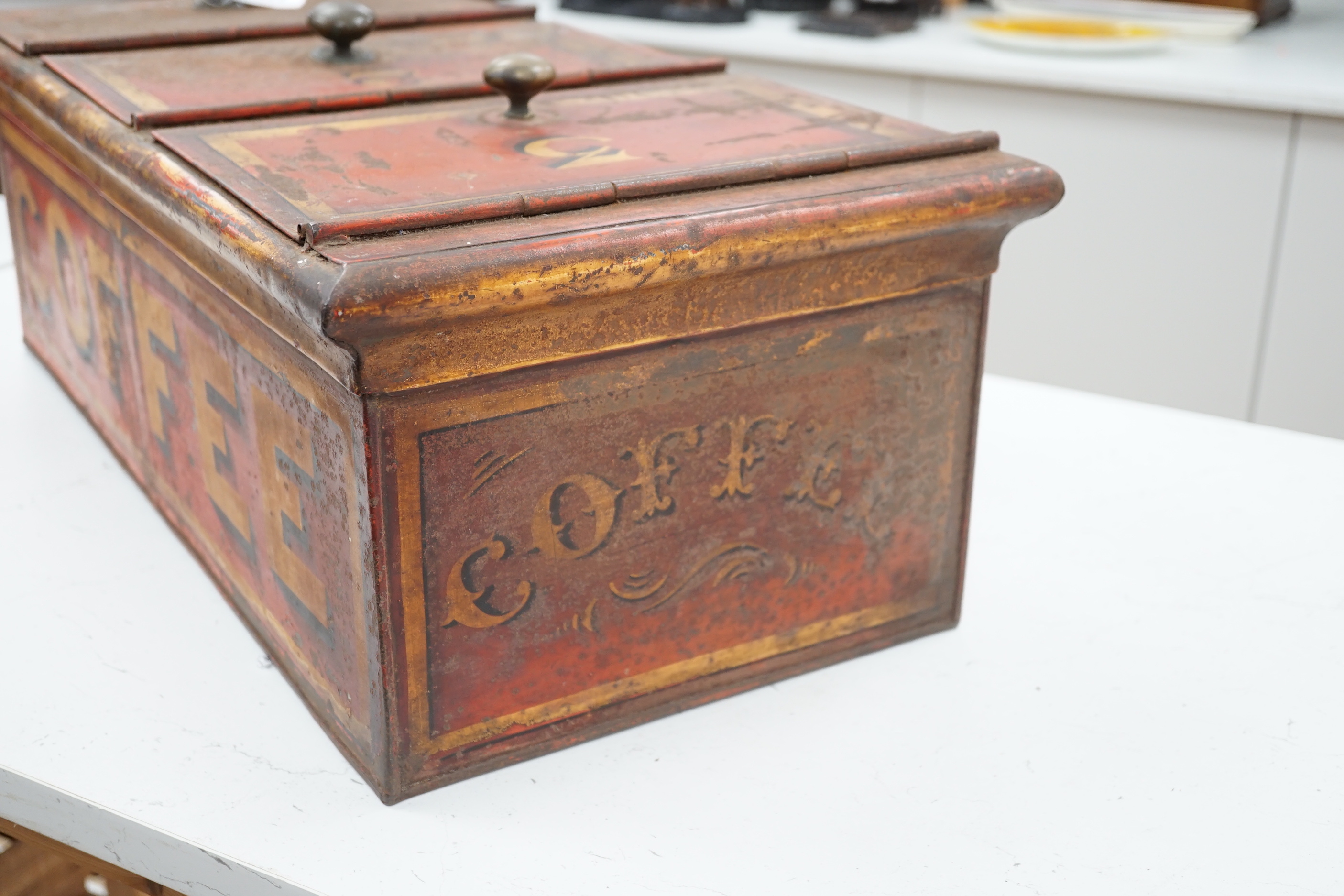 A Victorian painted retailer's advertising coffee tin with three compartments, 64cm wide